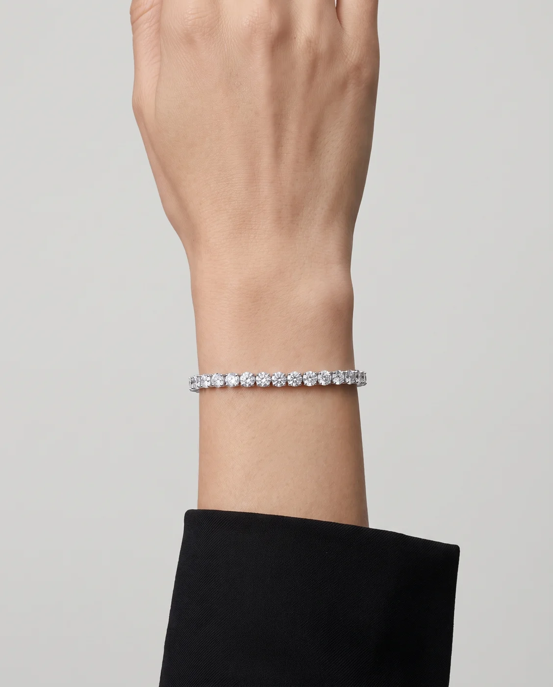 The Rive tennis bracelet worn on the wrist