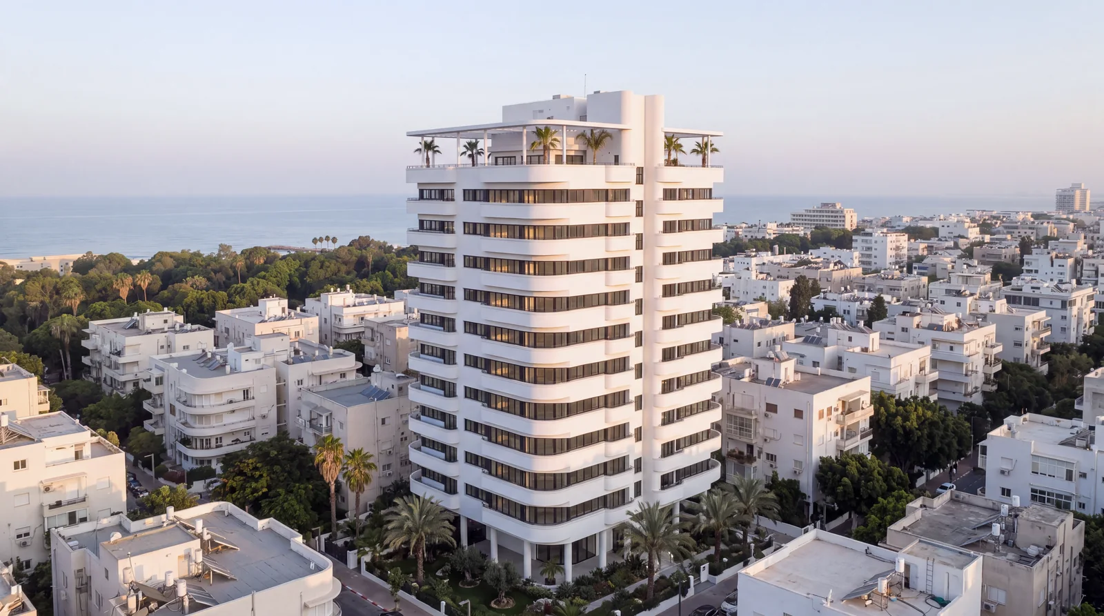 Aerial render of the ALBA residential tower, a fictional project: the tower seen from above with the rooftops and streets around it